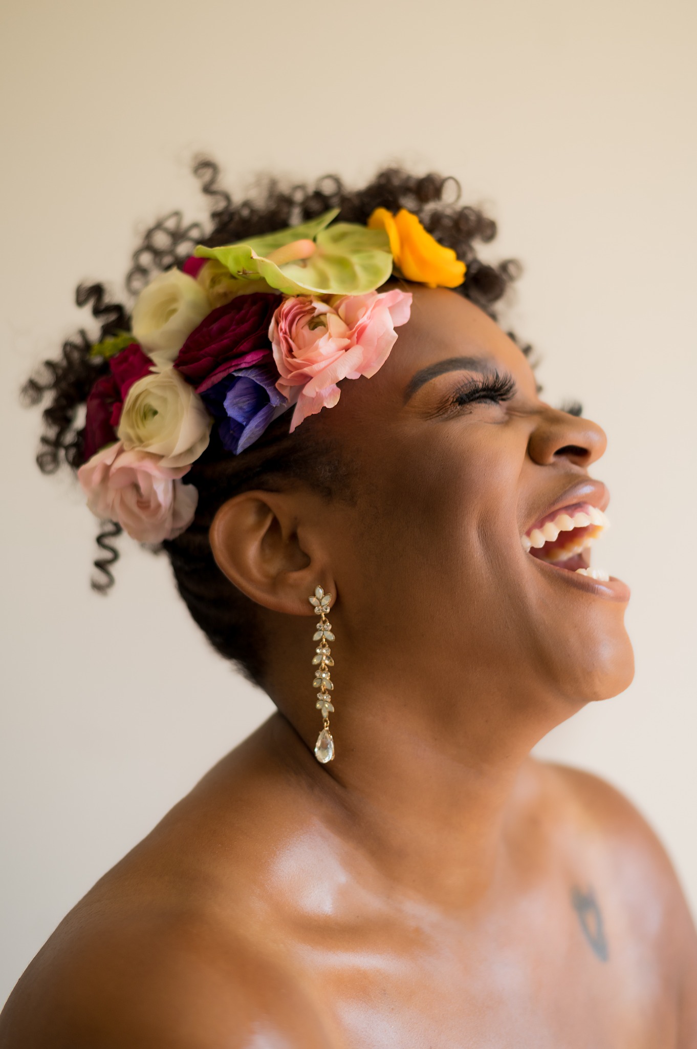 Laughing in a fresh floral crown